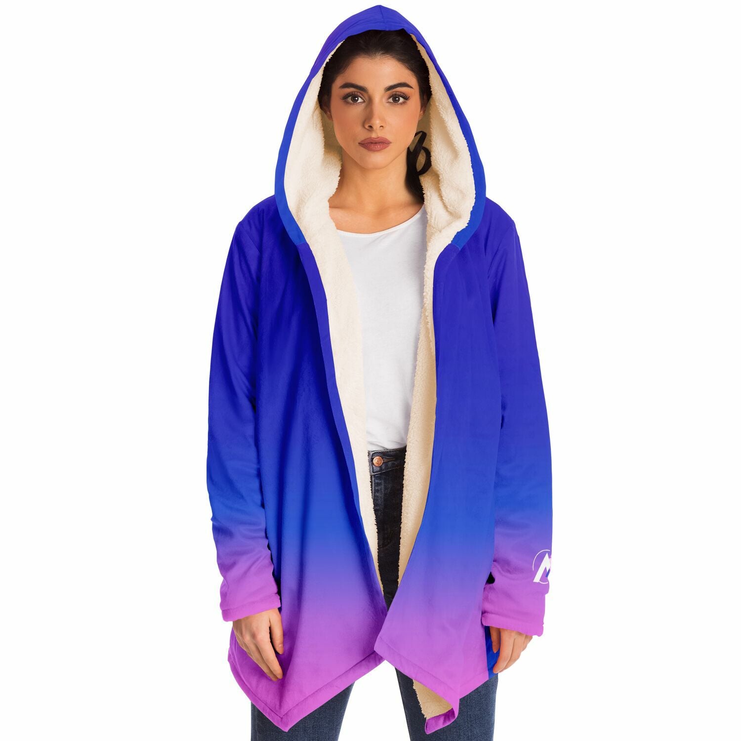 A woman wearing the Ethereal Gem 1337 Cloak, showcasing its hooded design and luxurious fabric, perfect for warmth and style on chilly days.