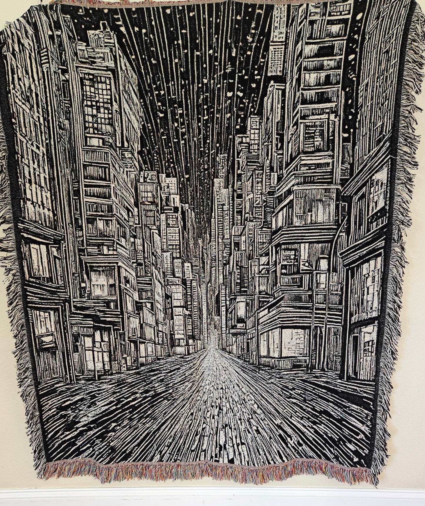 Urban Nightscape I woven blanket featuring a city street at night, intricately crafted for luxury and personal style. Made from 100% pure cotton.