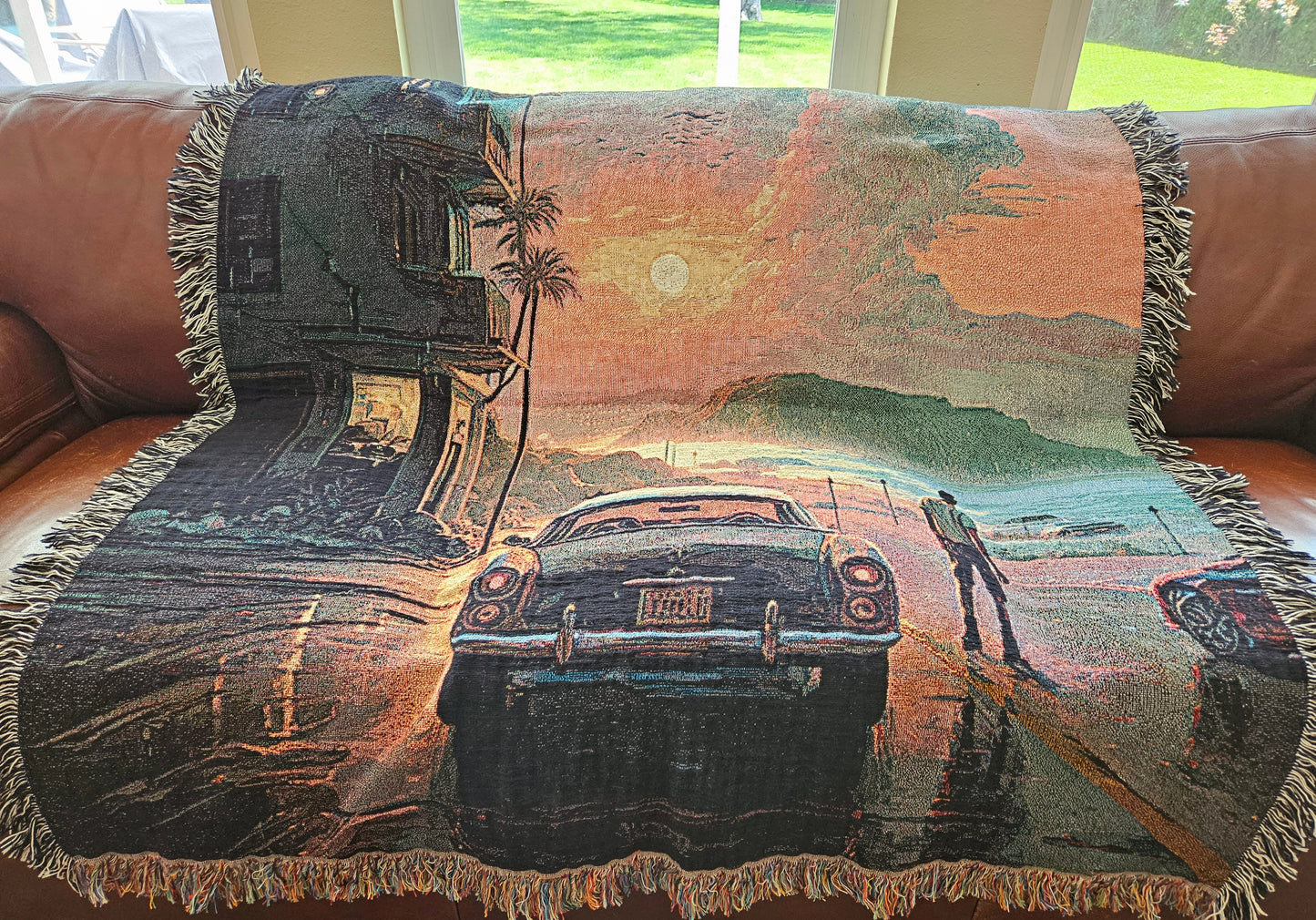 Man walking by a car under rain depicted on the Reflections in the Rain woven blanket from Artifact1337, showcasing luxury and intricate weaving.