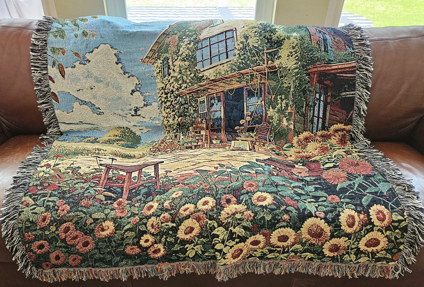 Bohemian Sunflower House woven blanket featuring a house and sunflowers, crafted from 100% cotton, ideal as a luxurious home decor piece.