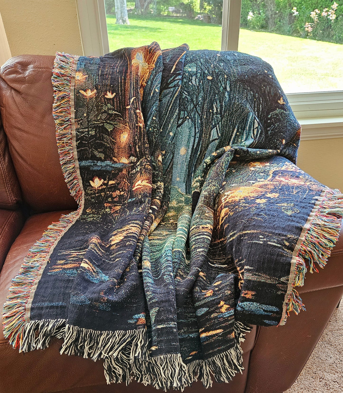 Woven blanket featuring Forest of Magic design, depicting a girl in a lit forest, blending art and luxury for home decor.