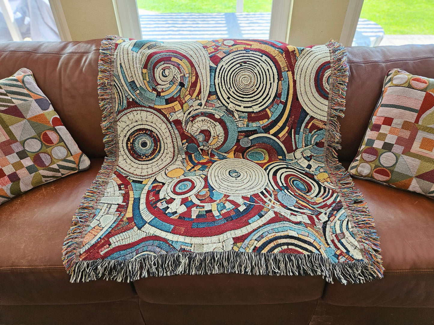 Spiral Abstraction I Woven Blanket featuring a vibrant pattern, showcasing artistic motifs, made from 100% pure cotton for a luxurious touch.