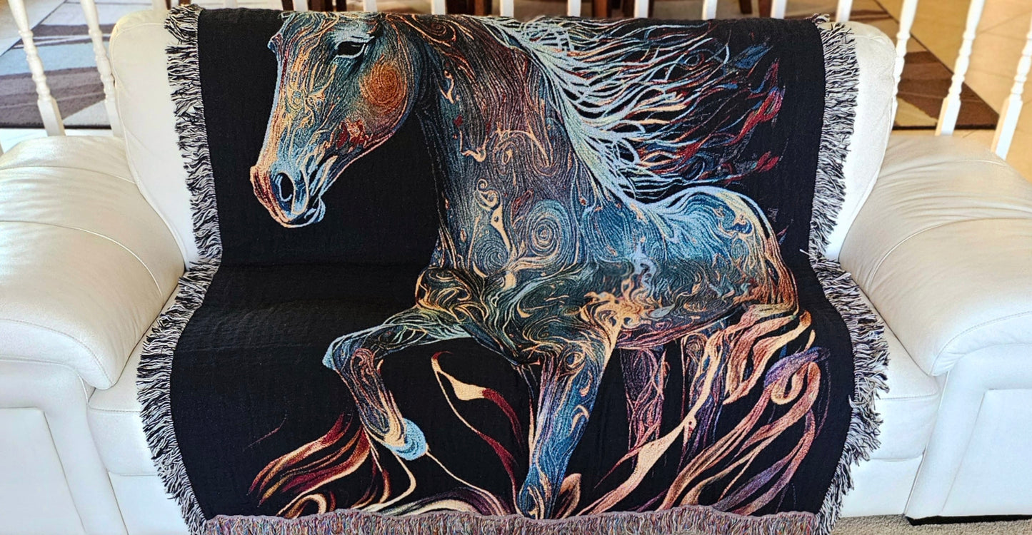 Embermane Woven Blanket featuring a vibrant horse painting, crafted from 100% cotton for a luxurious and durable home accent.