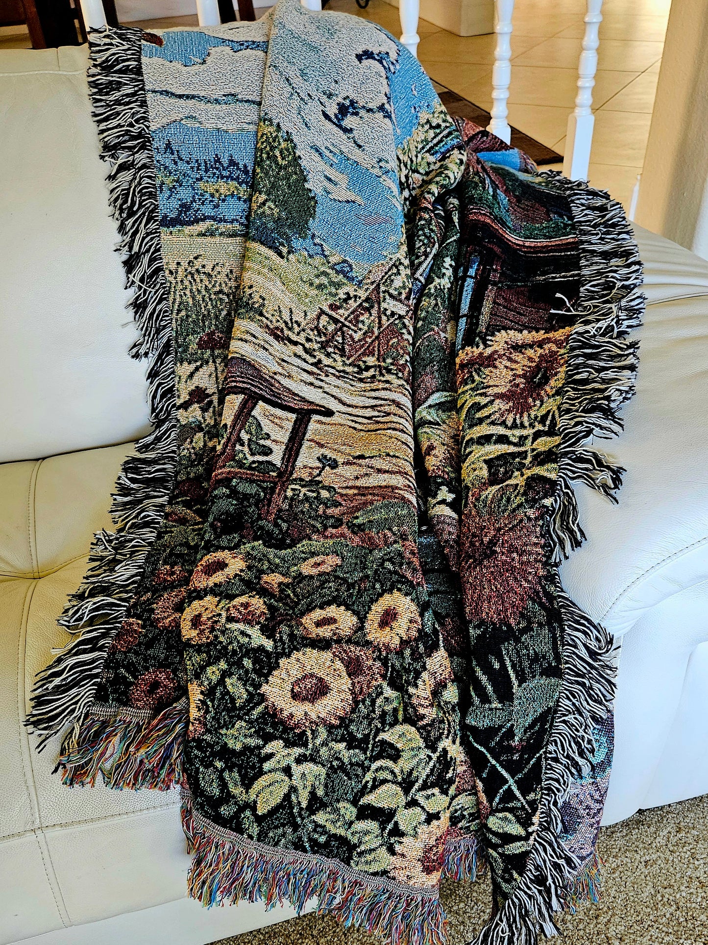 Bohemian Sunflower House woven blanket featuring a house and sunflowers, crafted from 100% cotton, ideal as a luxurious home decor piece.