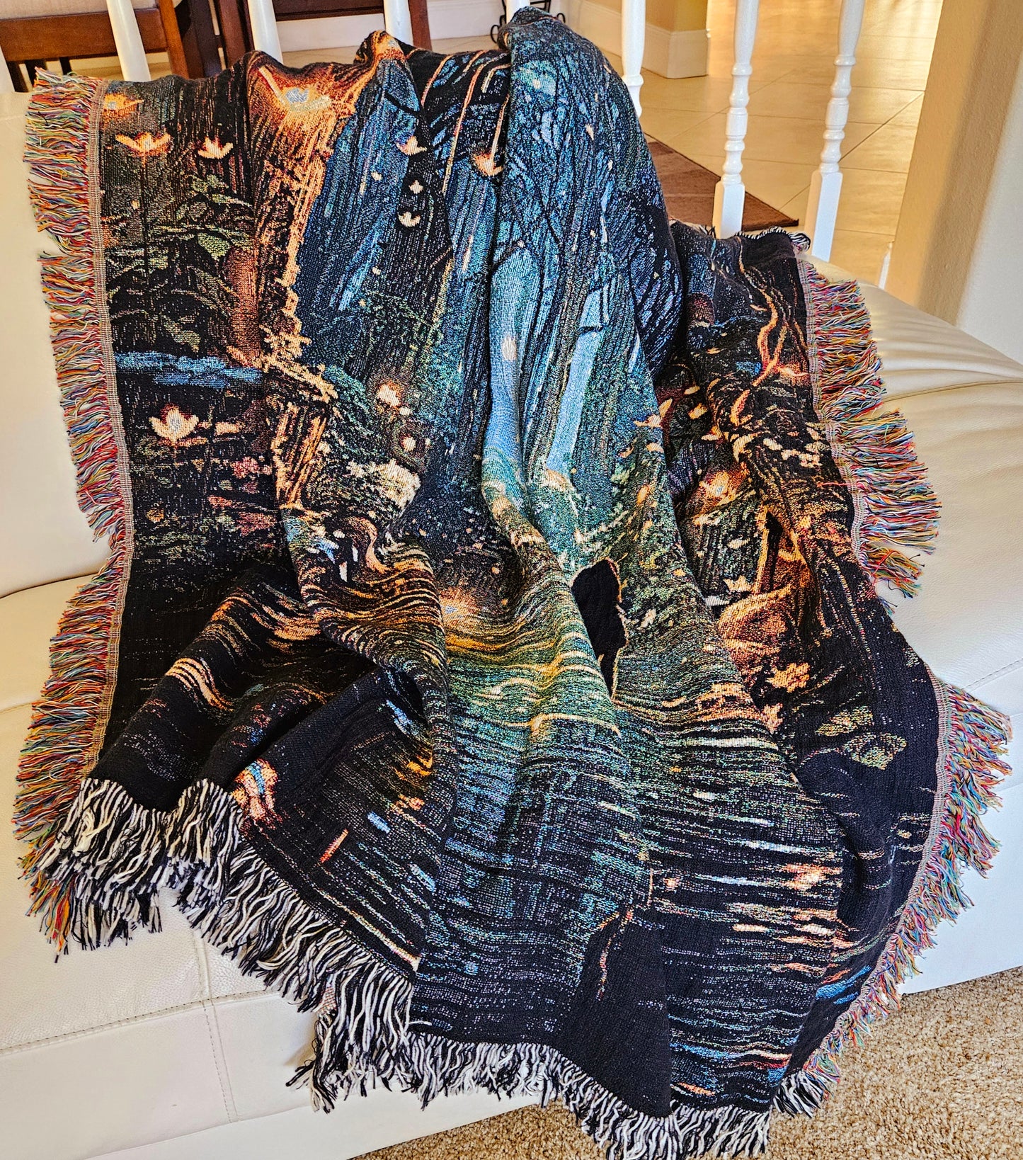 Woven blanket featuring Forest of Magic design, depicting a girl in a lit forest, blending art and luxury for home decor.