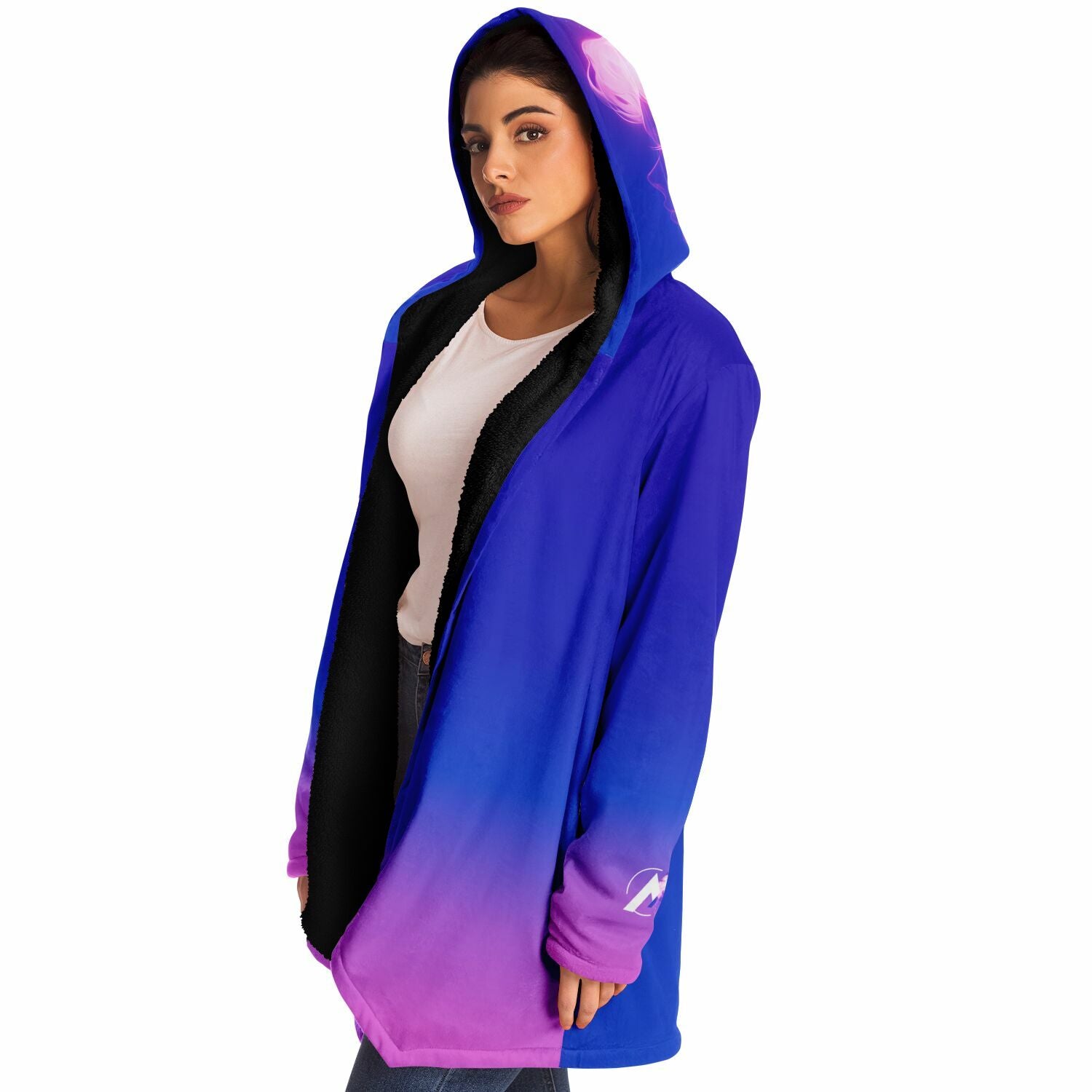 A woman wearing the Ethereal Gem 1337 Cloak, showcasing its hooded design and luxurious fabric, perfect for warmth and style on chilly days.