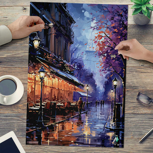 Paris in Lavender I Puzzle featuring a rainy street scene with people, tables, and vibrant artwork. Available in 500 and 1000 pieces, made from premium ivory cardboard.