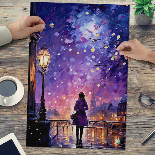 Paris in Lavender II puzzle featuring a woman on a bridge under a street lamp, available in 500 or 1000 pieces, premium cardboard finish.