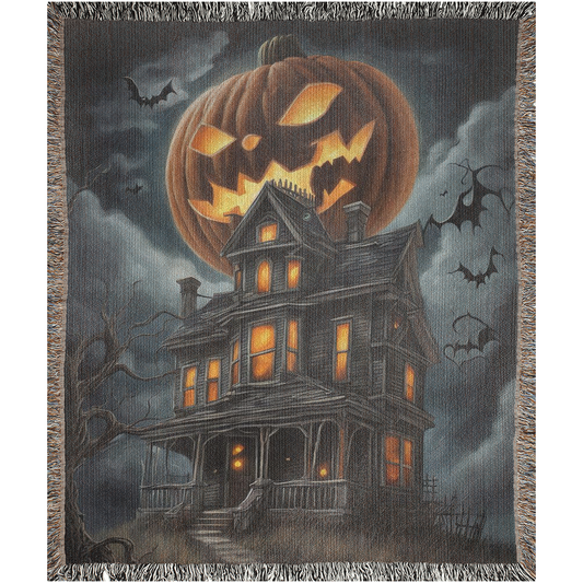 Pumpkin Manor woven blanket featuring a pumpkin atop a house, perfect for adding luxury and personality to your home decor.