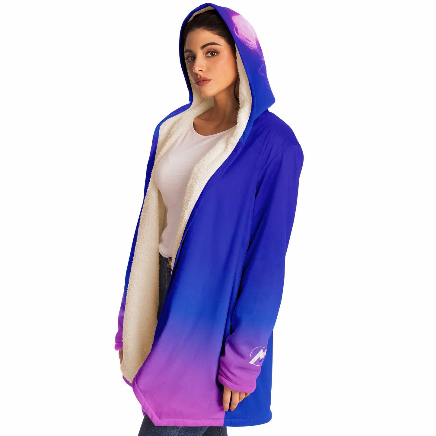 A woman wearing the Ethereal Gem 1337 Cloak, showcasing its hooded design and luxurious fabric, perfect for warmth and style on chilly days.