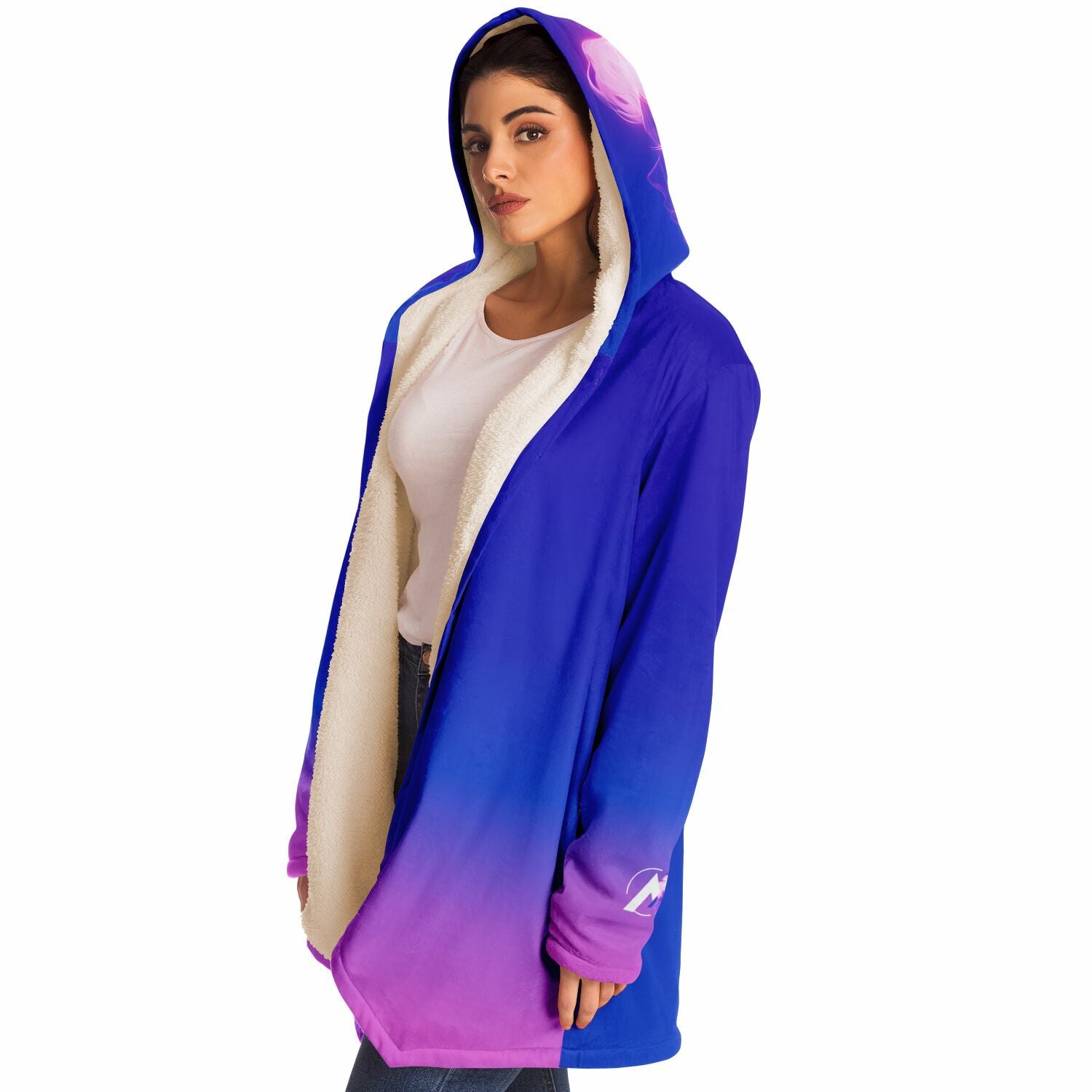 A woman wearing the Ethereal Gem 1337 Cloak, showcasing its hooded design and luxurious fabric, perfect for warmth and style on chilly days.