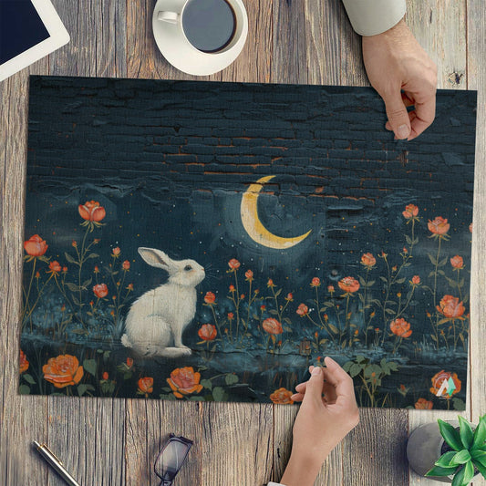Bunny Meadow Graffiti Puzzle features a rabbit among flowers and a moon, crafted on premium ivory cardboard, available in 500 and 1000 pieces.