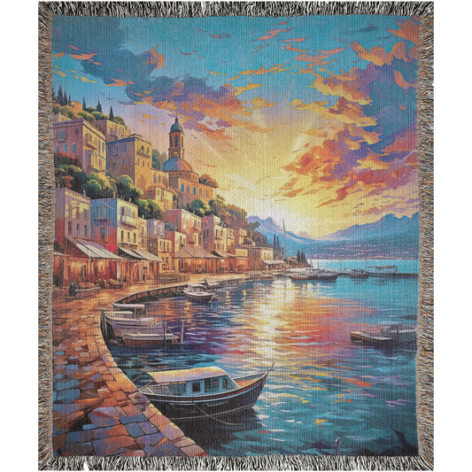 Capri Sunset Woven Blanket featuring a vivid tapestry design with boats on water, crafted from 100% cotton for luxury and durability.