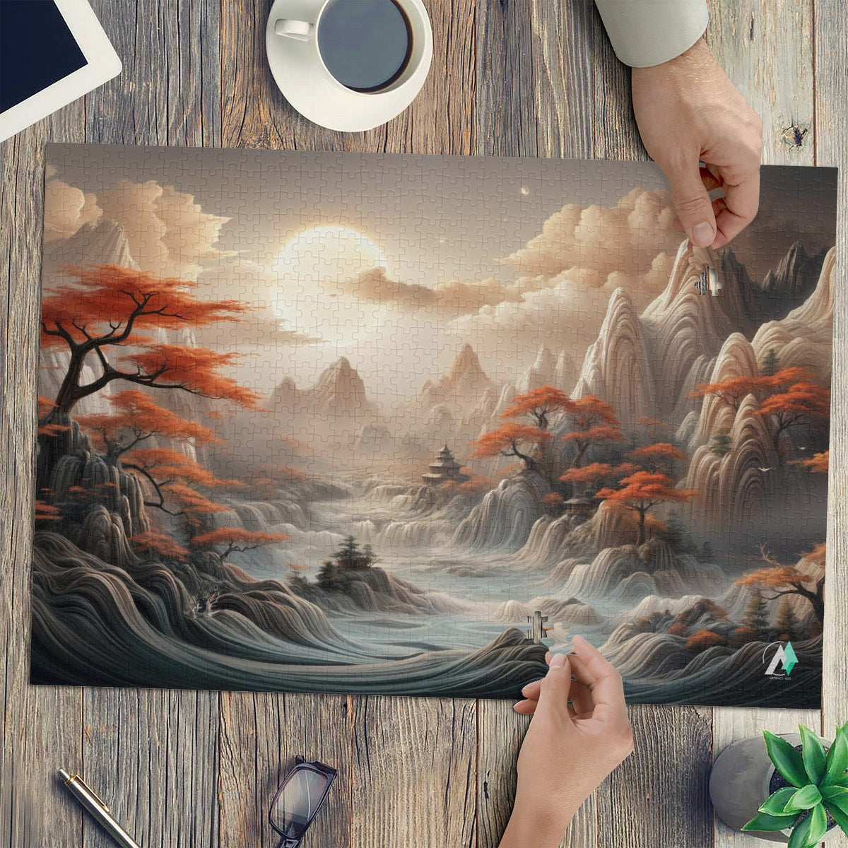 The Mystical Valley Puzzle featuring a mountain landscape, river, and tree with orange leaves; available in 500 or 1000 pieces.