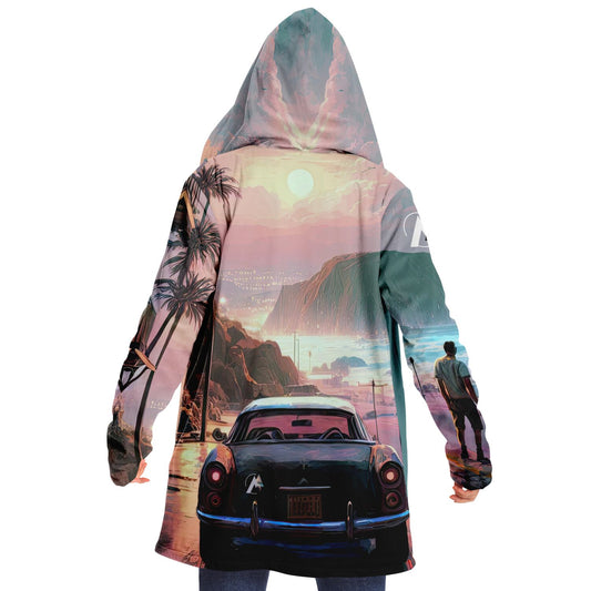 A person wears the Reflections in the Rain 1337 Cloak, featuring a car and sunset design, crafted for comfort with micro-mink and fleece.