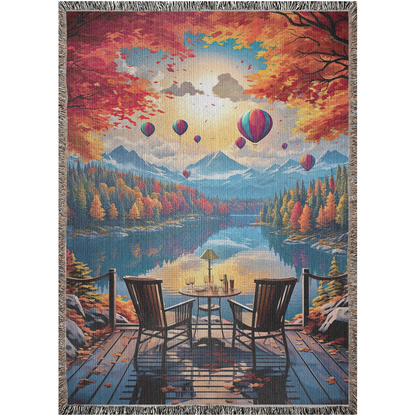 A digital painting of a deck with chairs, overlooking a serene lake with air balloons floating above. The forest in the background is turning to the color of Autumn.