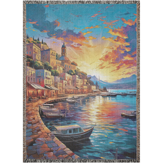 Capri Sunset Woven Blanket featuring a vivid tapestry design with boats on water, crafted from 100% cotton for luxury and durability.